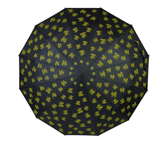 Black umbrella with yellow Corroboree Frogs, seen from above against white background.