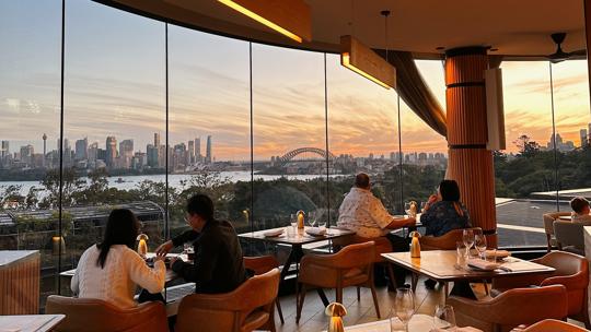 Image of Me-Gal Restaurant with Sydney CBD and harbour bridge view