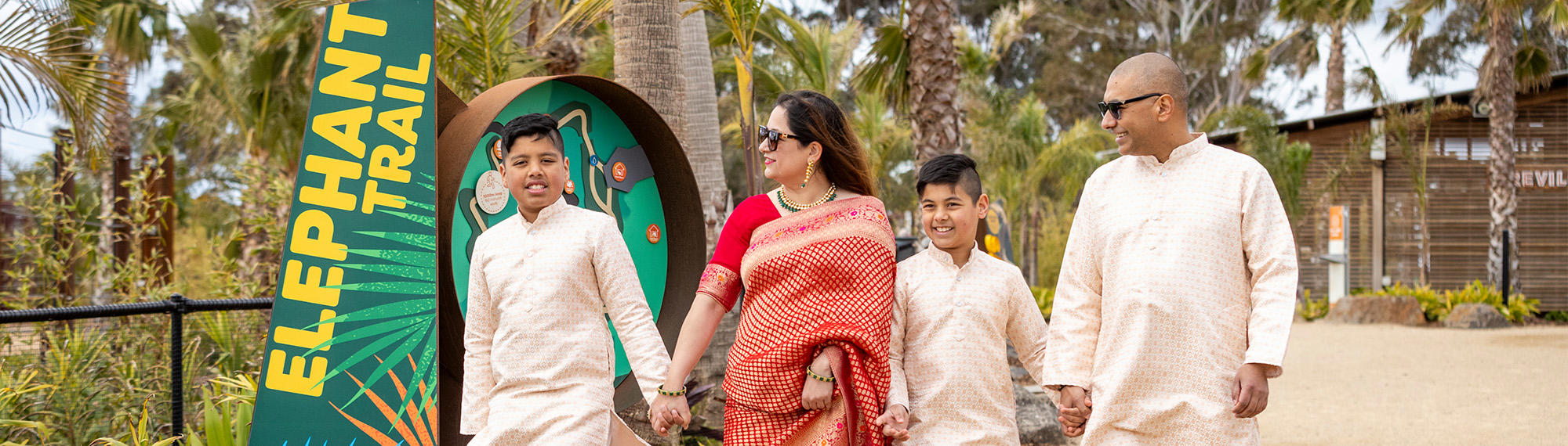 Family heading to the Elephant Trail