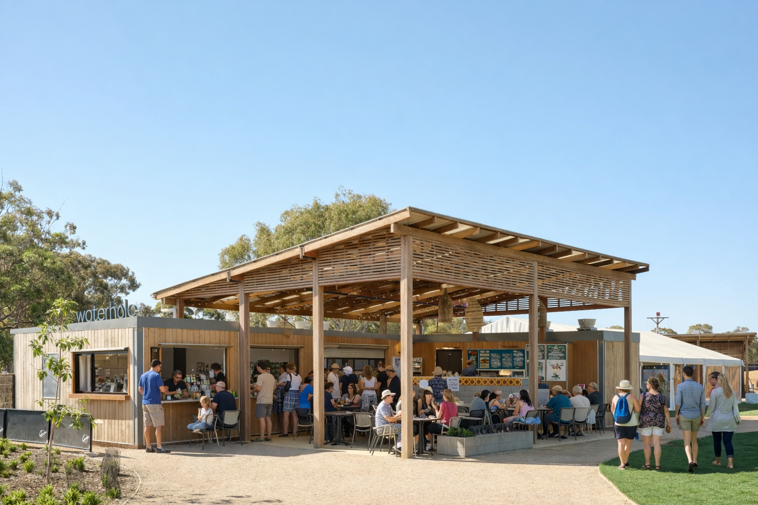 View of the Waterhole Café in service, beneath a clear blue sky.
