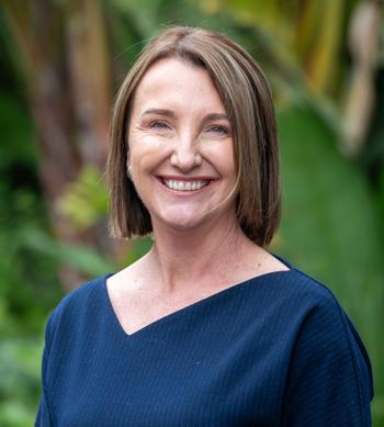 Rebecca McKenzie looking to the camera, smiling. 2026