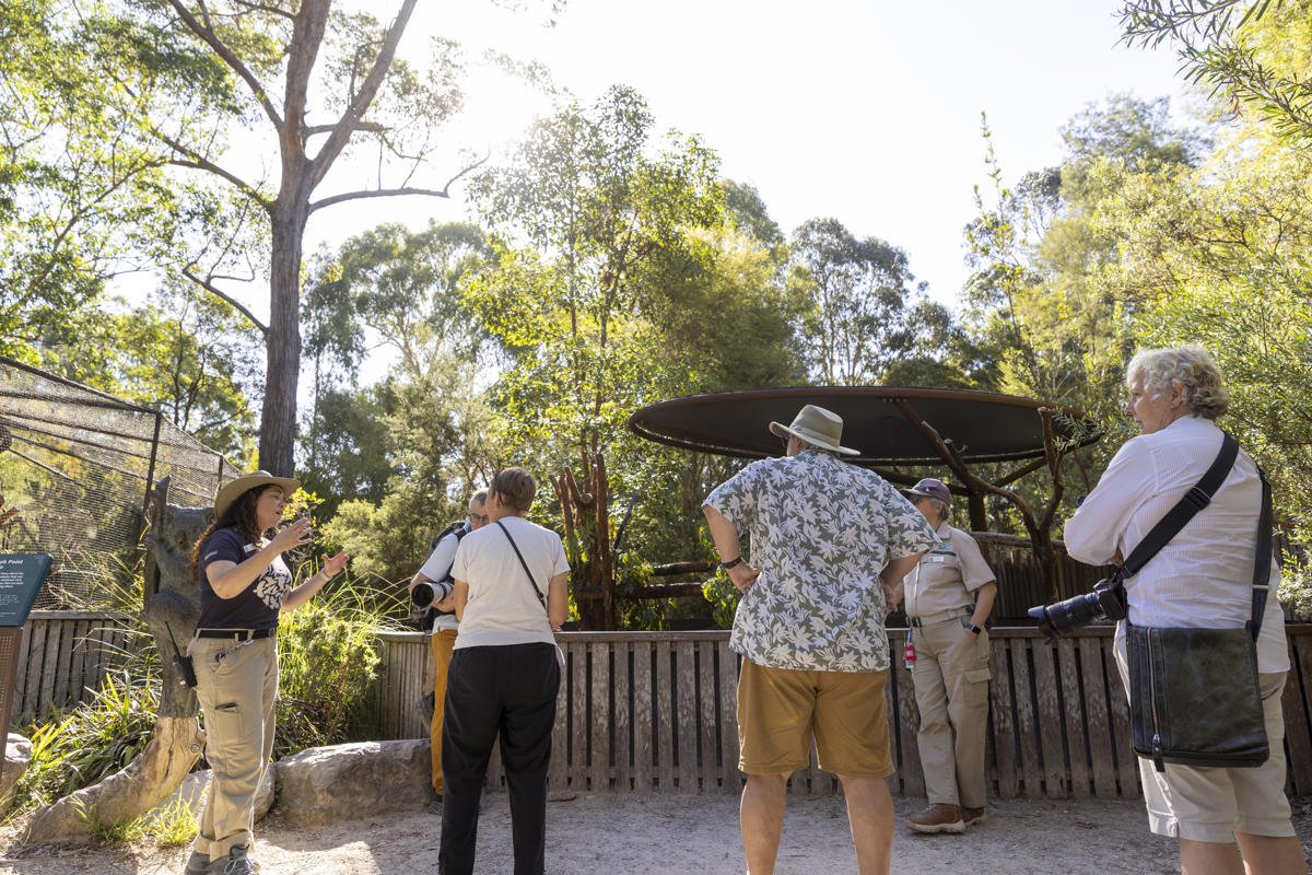 Two Keepers hosting talk with five guests.