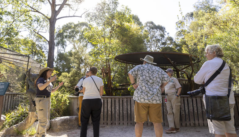 Two Keepers hosting talk with five guests.