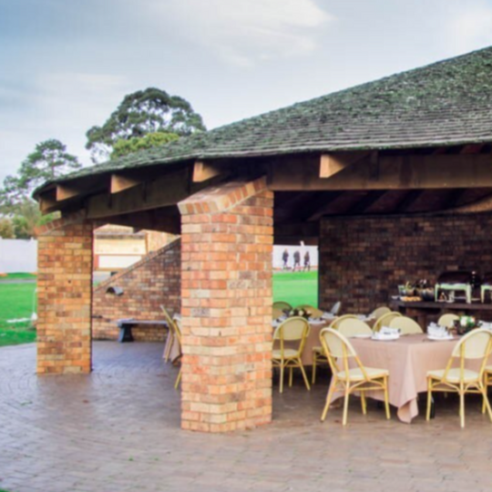 View of the MZ Pavilion (1 to 3) with tables and chairs set-up inside.