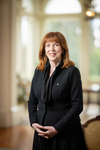 Her Excellency Professor, the Honourable Margaret Gardner AC, Governor of Victoria, smiling to the camera.