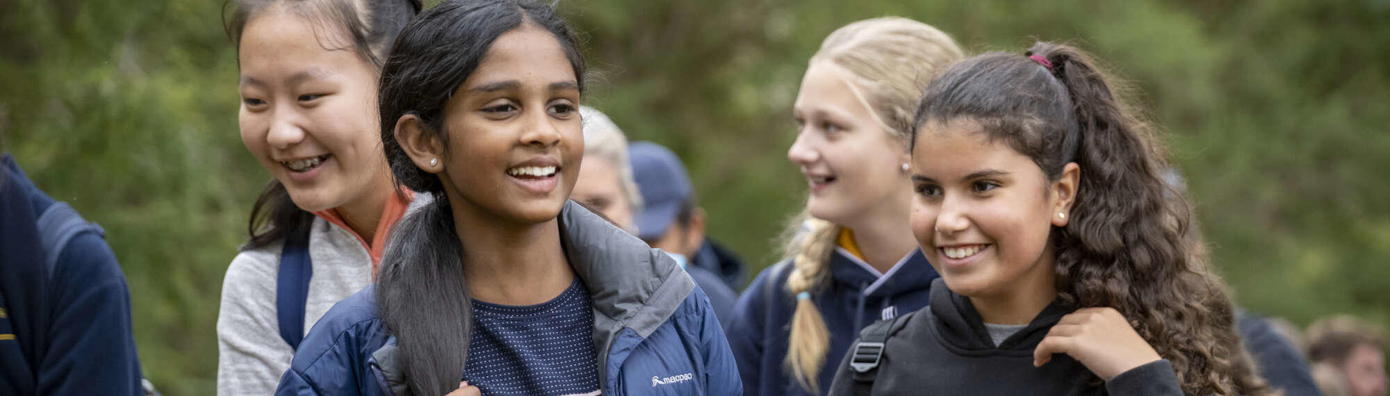 Focus in two visiting students, in a cluster of (at least) ten.