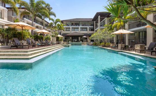 Oaks Hotels, Resort and suites with a central swimming pool.