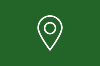 White line icon of a downward facing drop-pin, on a deep green background.