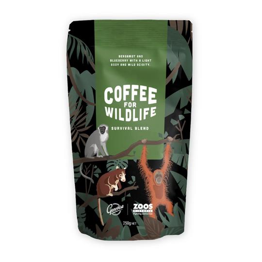 A coffee bag featuring the label 'Coffee for Wildlife: Survival Blend' and an illustration of an orangutan, Vervet Monkey, and a tree kangaroo