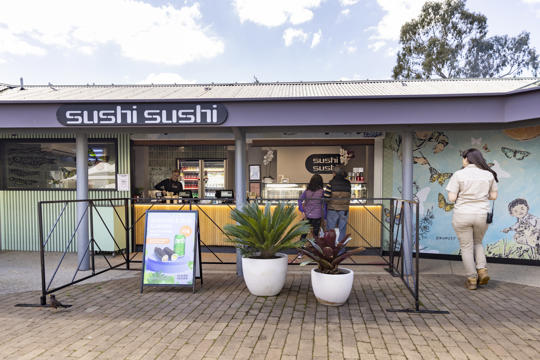 View of Sushi Sushi stall at the Lakeside Plaza, with four people present.